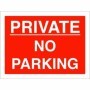 Private no parking sign with bold white text on red background