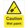 Caution wet paint safety sign with paintbrush symbol