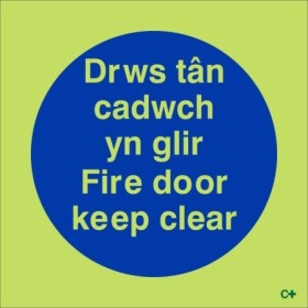 Glow in the dark Welsh and English fire door keep clear safety sign