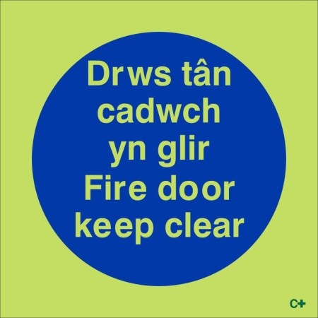 Glow in the dark Welsh and English fire door keep clear safety sign