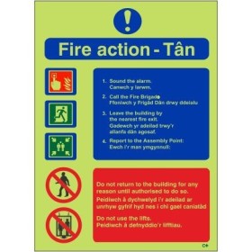 Glow in the dark Welsh and English fire action notice safety sign