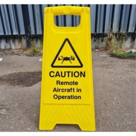 Caution remote aircraft in operation freestanding warning sign