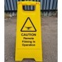 Caution remote filming in operation freestanding warning sign