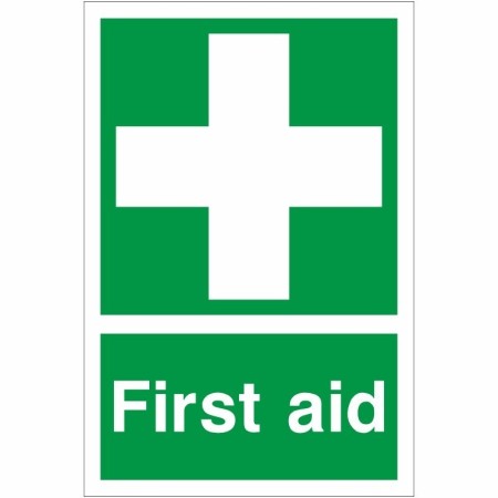 First Aid safety sign with white cross on green background