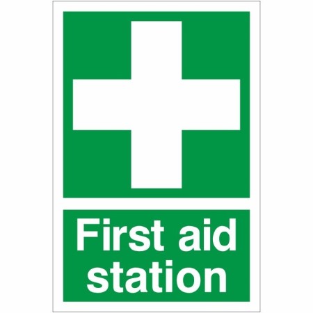 First Aid Station safety sign with white cross on green background