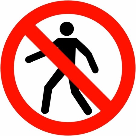 No Pedestrians prohibition safety sign with pedestrian symbol and red circle
