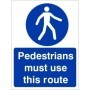 Pedestrians Must Use This Route mandatory safety sign with pedestrian symbol and blue background