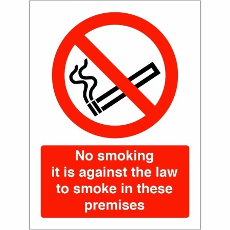 No smoking it is against the law to smoke in these premises sign