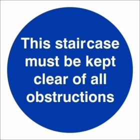 This staircase must be kept clear of all obstructions mandatory safety sign