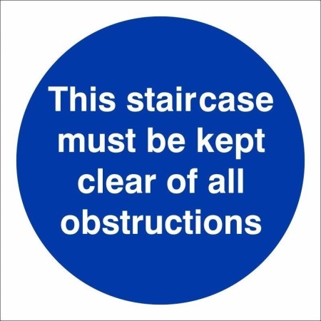 This staircase must be kept clear of all obstructions mandatory safety sign