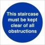 This staircase must be kept clear of all obstructions mandatory safety sign