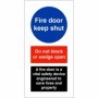 Fire door keep shut sign with fire safety instructions and warning text