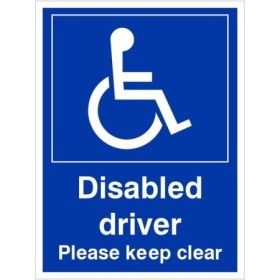 Disabled driver please keep clear sign with wheelchair symbol and bold white text on blue background