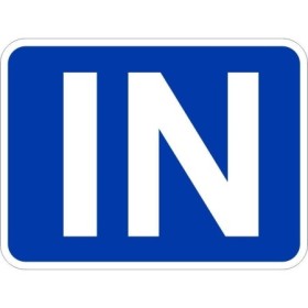 In traffic sign with white text on blue background