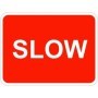 Slow traffic sign with bold white text on red background