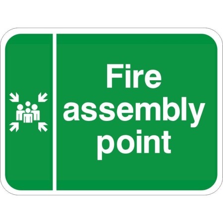 Fire assembly point traffic sign with white text and symbol on green background