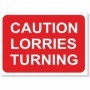 Caution Lorries Turning road sign with white text on red background