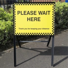 Please Wait Here yellow safety sign on Dibond panel
