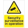 Security Surveillance In Operation warning sign with CCTV camera symbol