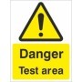 Danger Test Area sign with warning symbol and test area message