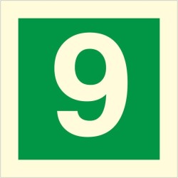 Glow in the dark fire sign displaying the number 9 for emergency floor identification