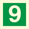 Glow in the dark fire sign displaying the number 9 for emergency floor identification